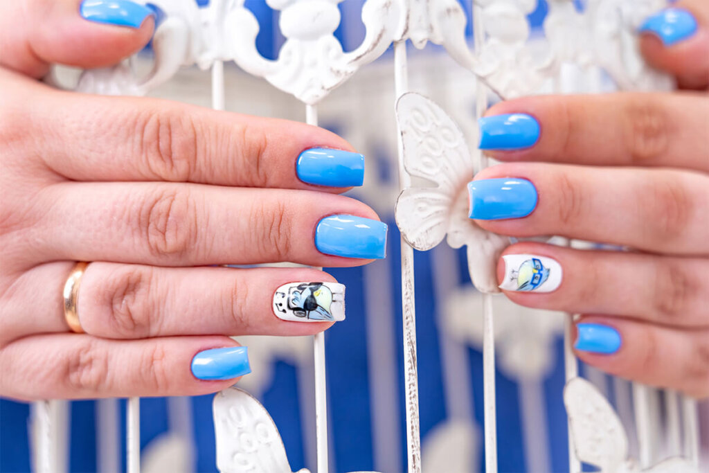 Lot of color gloss manicure hand has different blotches in a lig