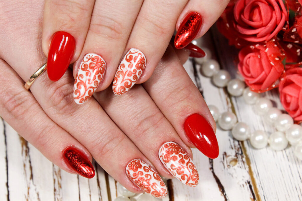 a close up of nails in red color.